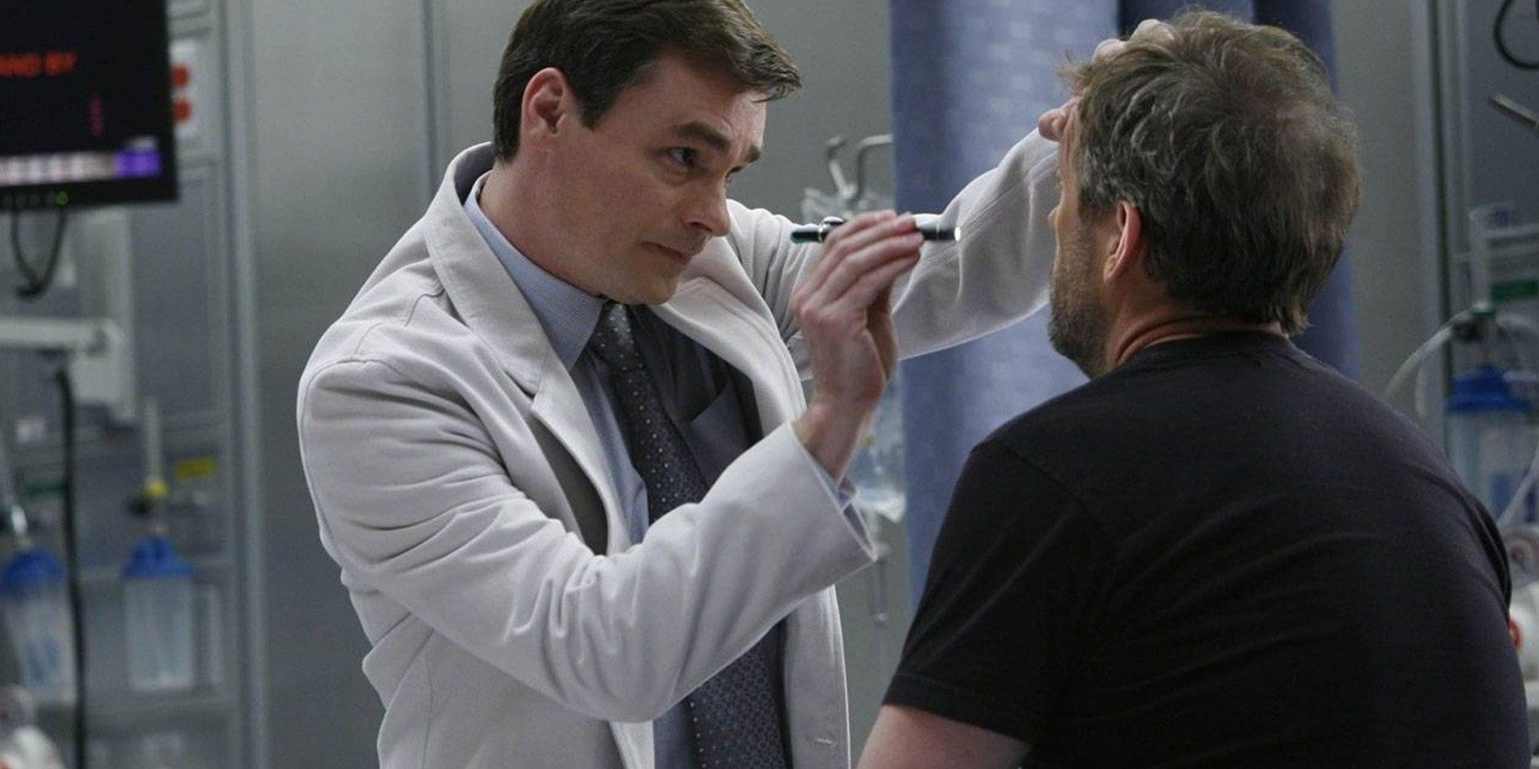 Robert Sean Leonard as James Wilson examining House's vitals in House MD 2x1