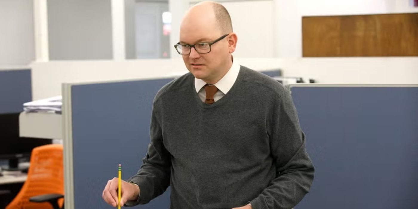 Colin Robinson, played by Mark Proksch, sharpening pencils in the office in 'What We Do in the Shadows.'