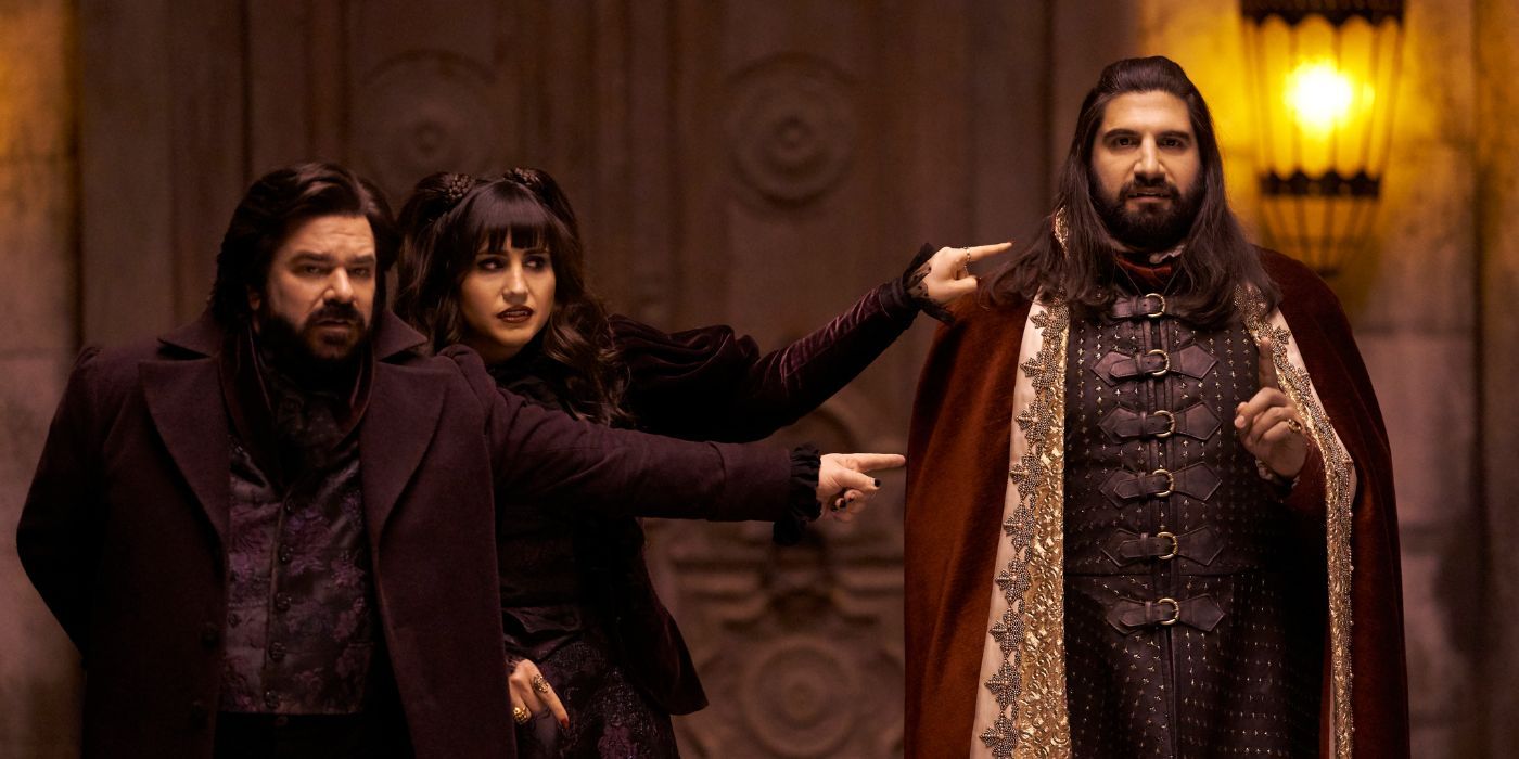 Laszlo, played by Matt Berry, Nadja, played by Natasia Demetriou, and Nandor, played by Kayvan Novak, at their trial in 'What We Do in the Shadows' Season 1, Episode 7.