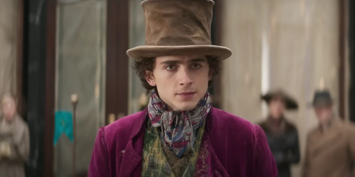 Timothee Chalamet as a young Willy Wonka looking intently in Wonka