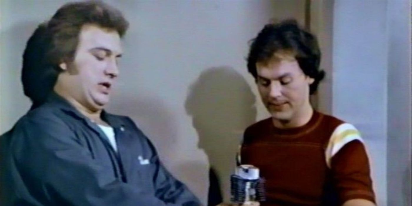 Jim Belushi and Michael Keaton as Ernie and Mike O'Rourke in Working Stiffs