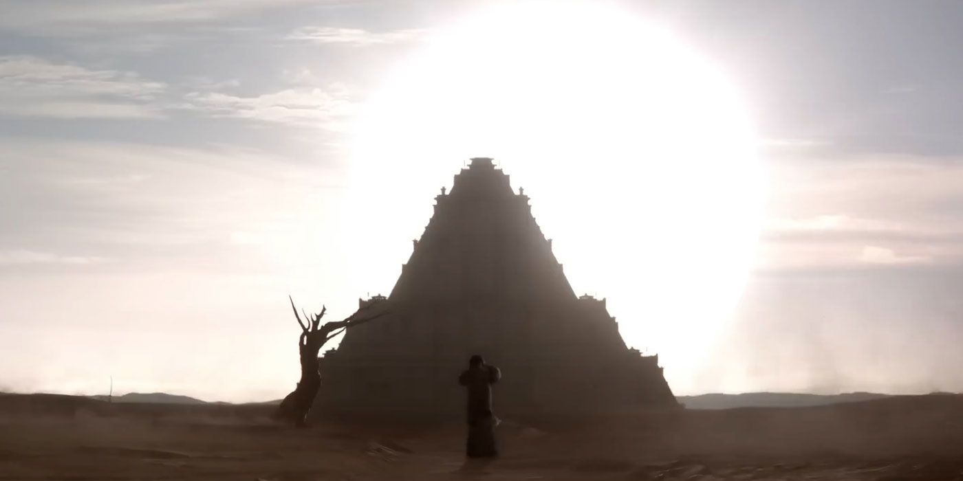 a person standing in front of a temple and huge Sun in Netflix's 3 Body Problem