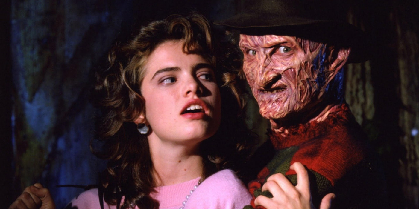 Freddy Krueger (Robert Englund) holding Nancy (Heather Langenkamp) in Nightmare on Elm Street 3: Dream Warriors