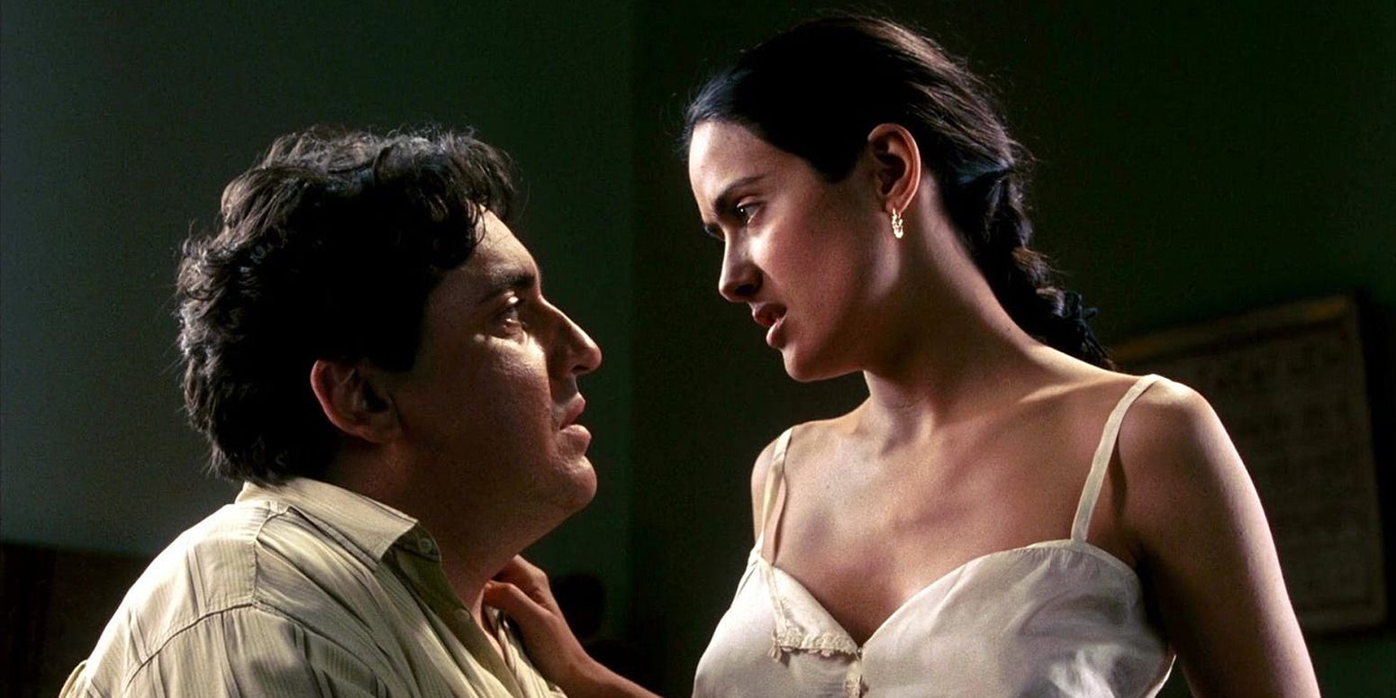 Alfred Molina and Salma Hayek in 'Frida', looking at each other in their pyjamas