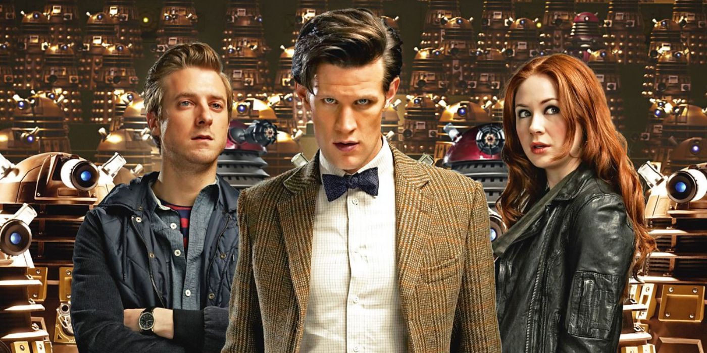 Rory (Arthur Darvill), Amy Pond (Karen Gillan), and the Doctor (Matt Smith) in Doctor Who in front of a bunch of daleks
