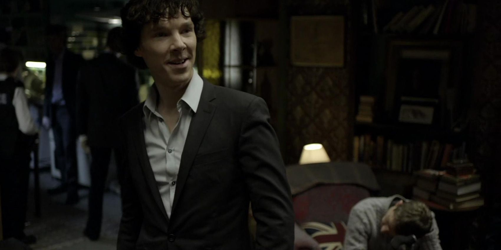 Benedict Cumberbatch is Sherlock Holmes in his crowded apartment