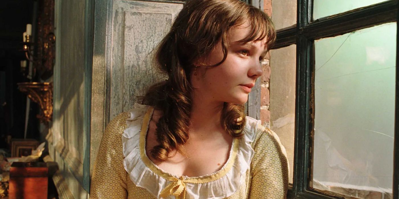 Carey Mulligan as Kitty Bennet looking out a window in 2005's Pride & Prejudice