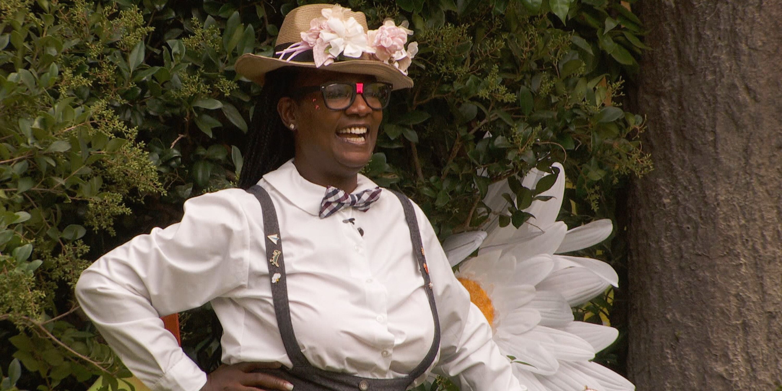 Cirie Fields is dressed in a white shirt, suspenders, and glasses for a 'Big Brother 25' competition