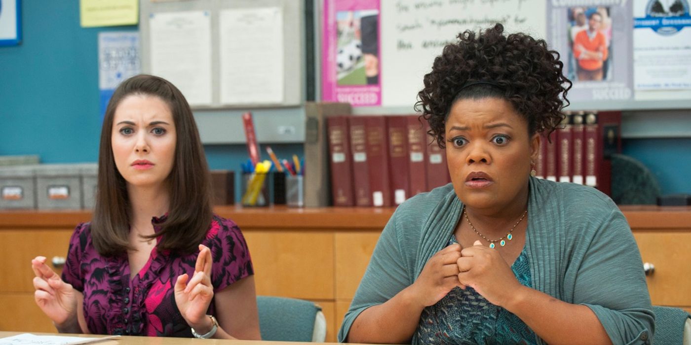 Annie (Alison Brie) and Shirley (Yvette Nicole Brown) looking stressed while playing Dungeons & Dragons in Community