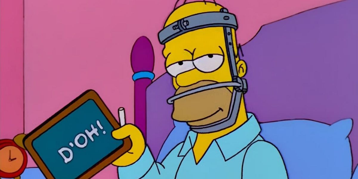 Homer Simpson (Dan Castellaneta) uses a chalkboard for his 