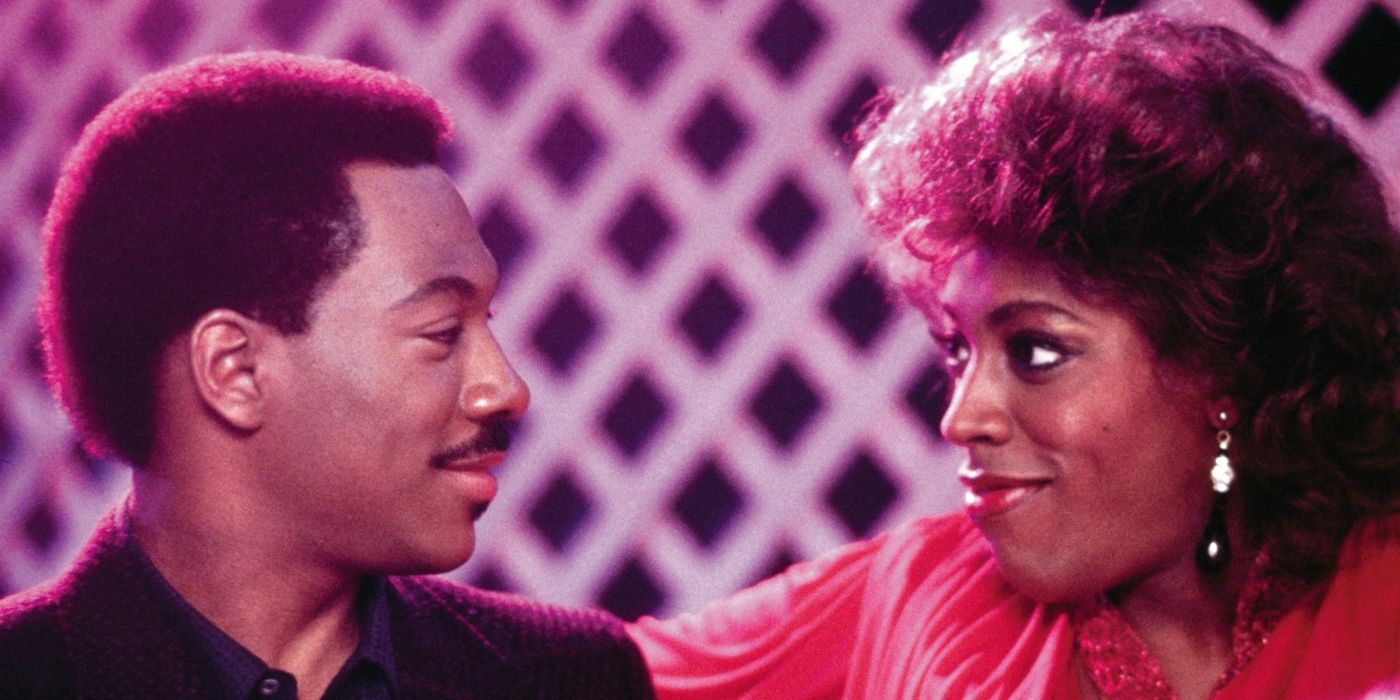 Eddie Murphy as Prince Akeem and Arsenio Hall as a woman at a nightclub in 'Coming to America.' 
