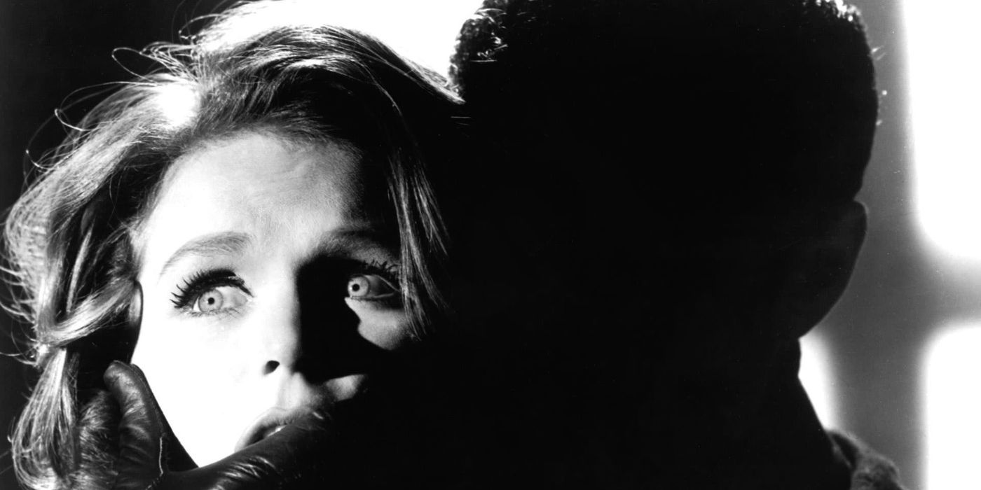 Lee Remick as Kelly Sherwood, looking terrified as the shadow of a man holds her in Experiment in Terror