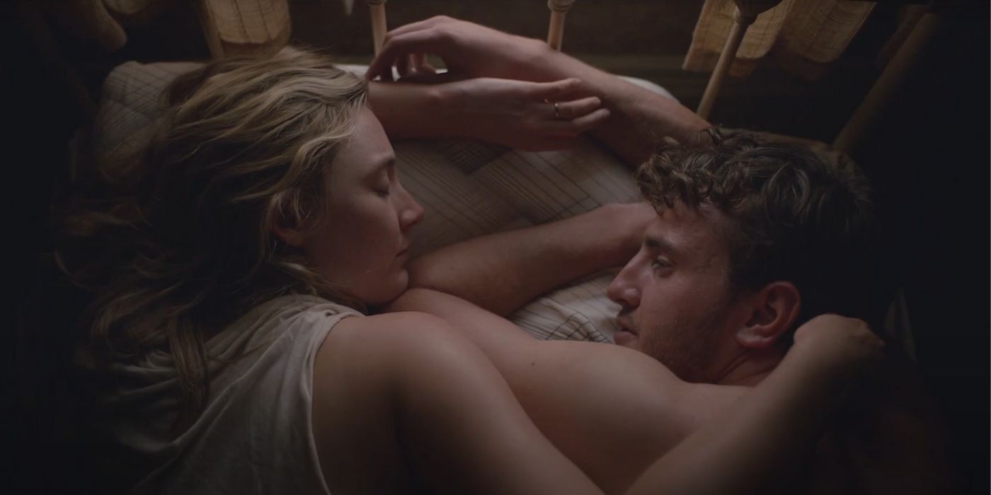 Saoirse Ronan and Paul Mescal lying in bed together in Foe 