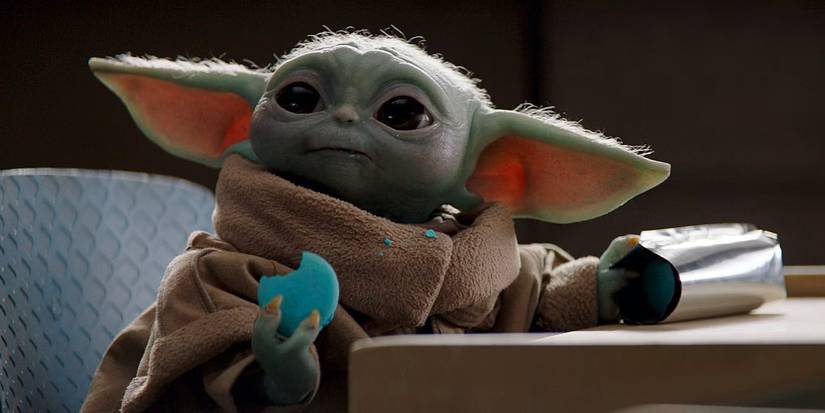 Grogu eats a blue cookie on 'The Mandalorian'
