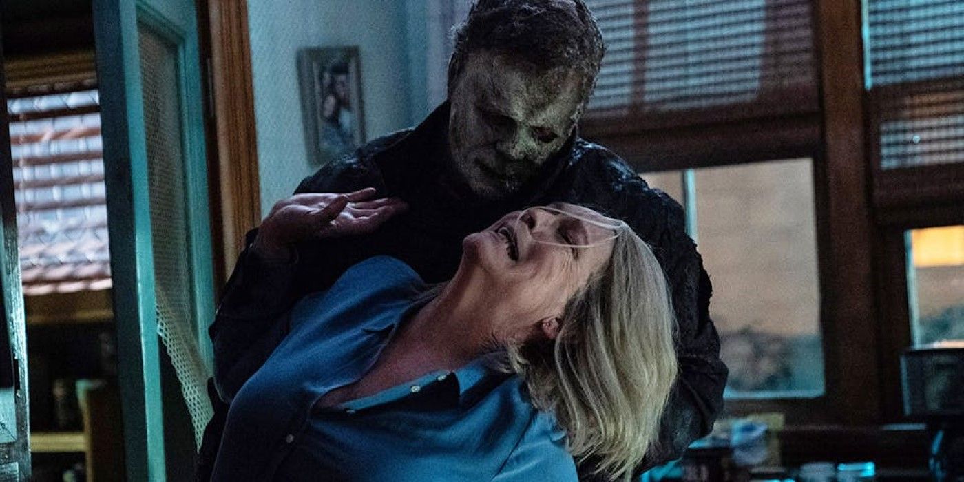 Michael Myers pulls Laurie Strode's head back in 'Halloween Ends'.