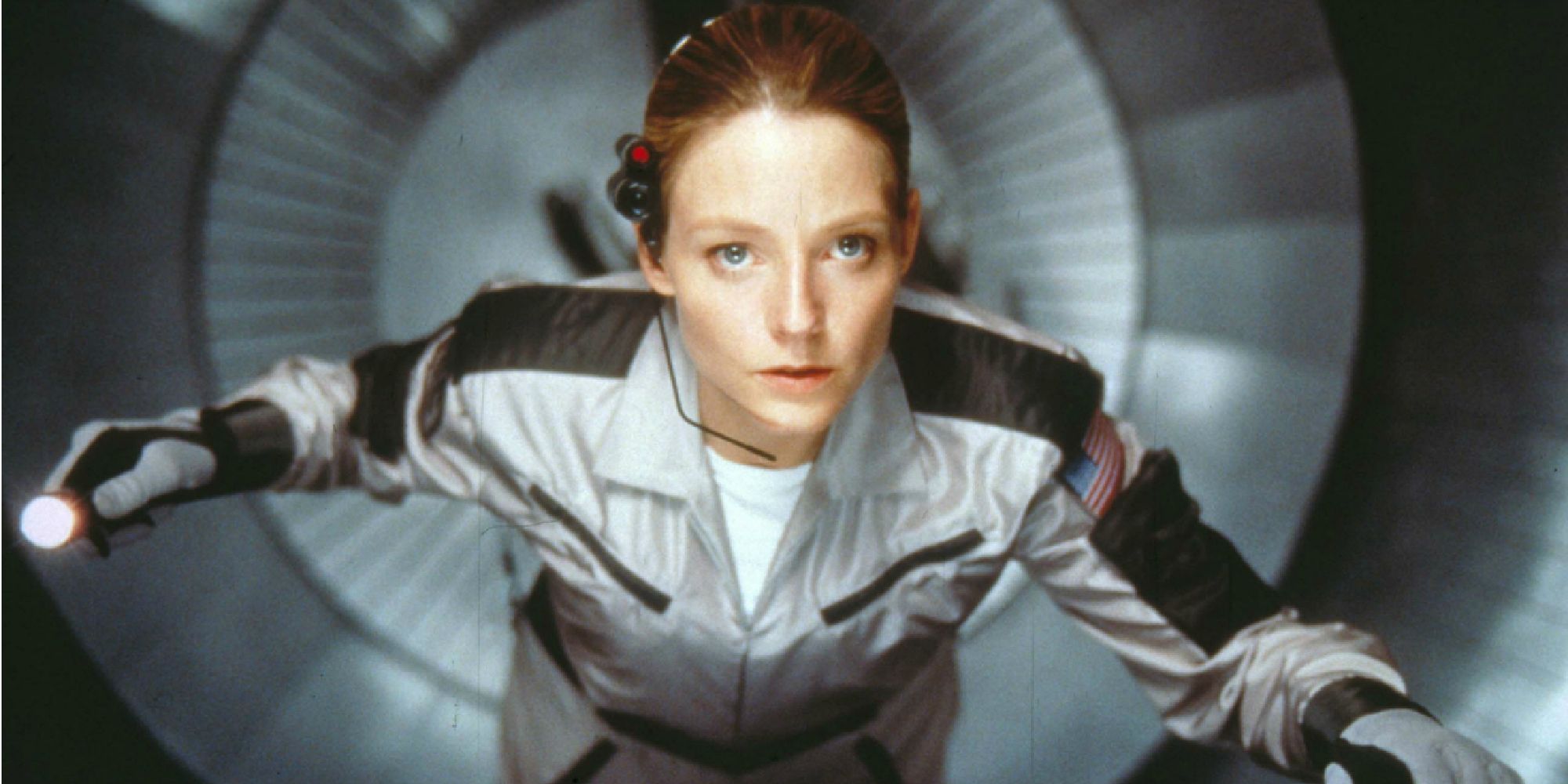 A shot of Jodie Foster inside a spaceship looking at the camera in Contact.