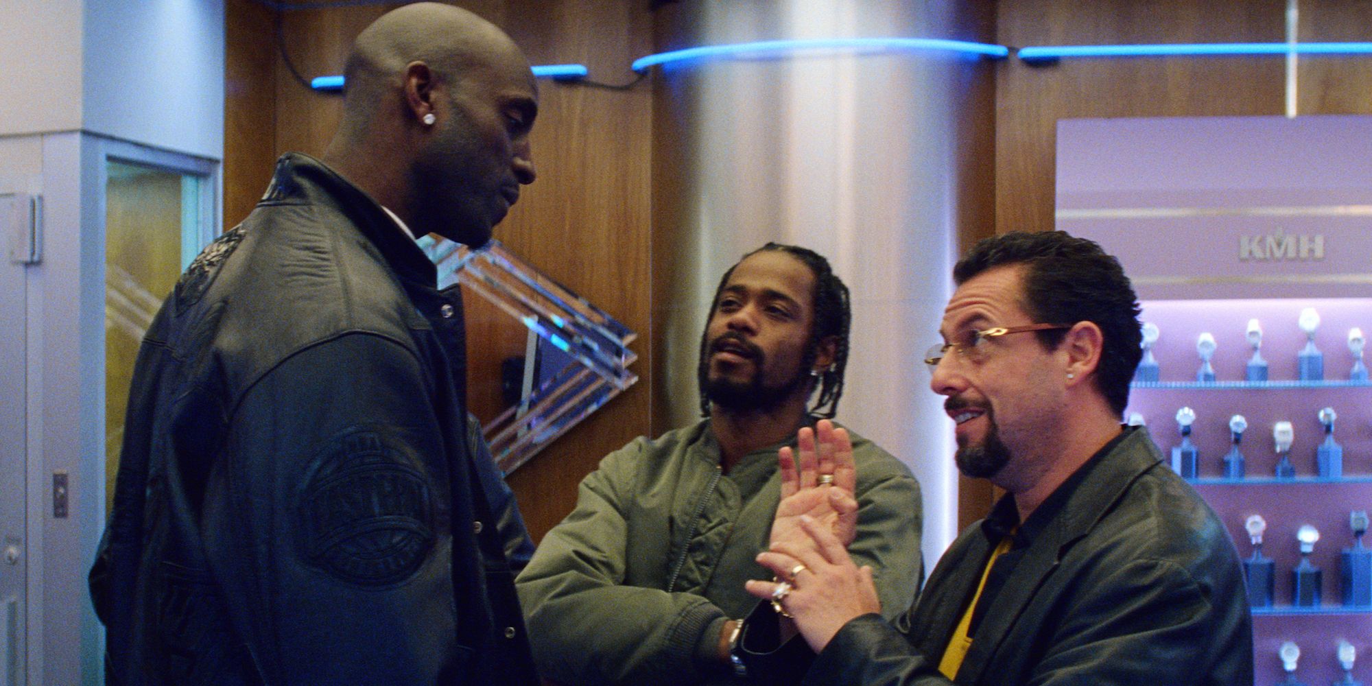 Adam Sandler's Howard Ratner talking to Demany (LaKeith Stanfield) and basketballer, Kevin Garnett in The Safdie Brothers' 'Uncut Gems' (2019).