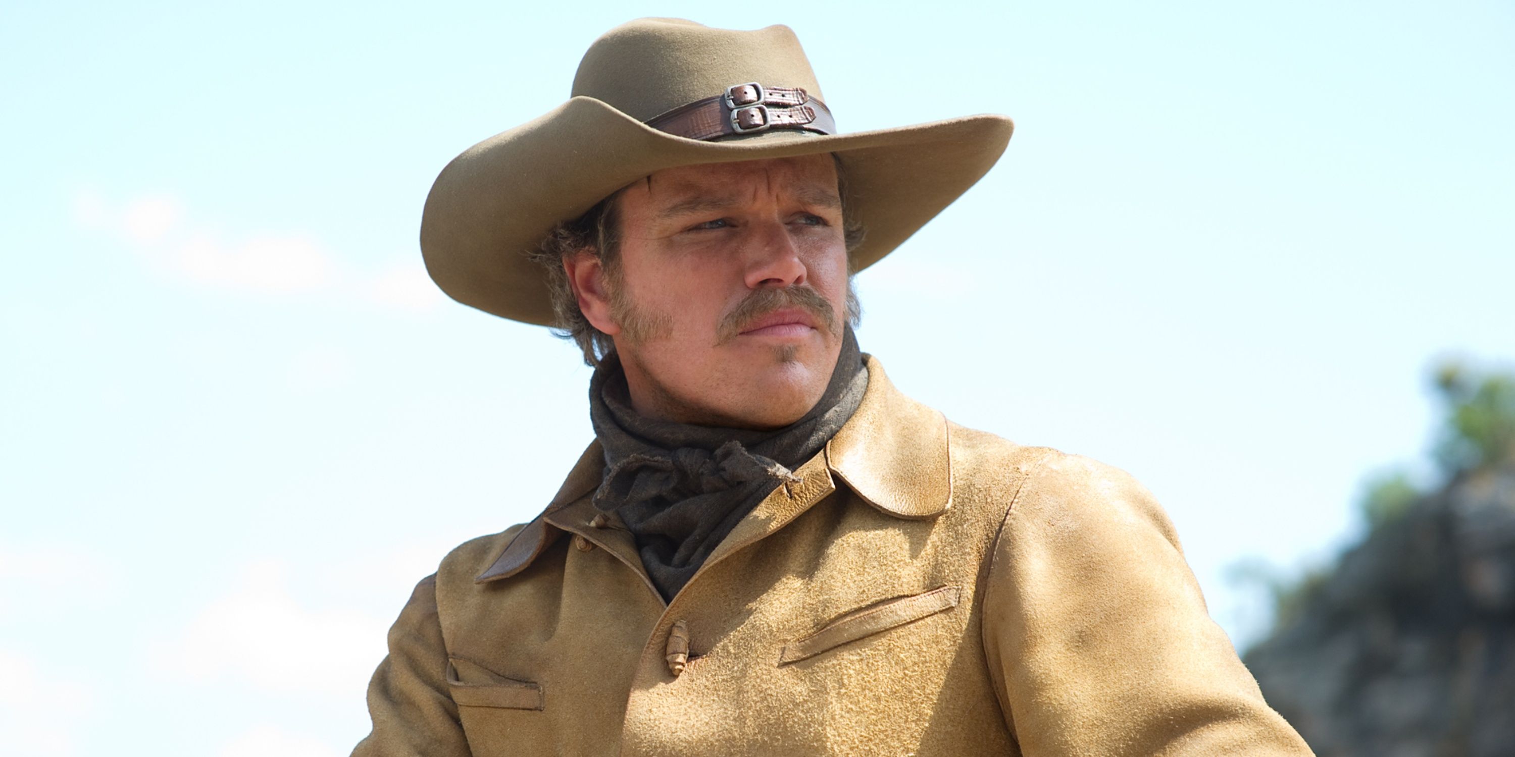 Matt Damon as Texas Ranger LaBoeuf looking to the distance in the film True Grit