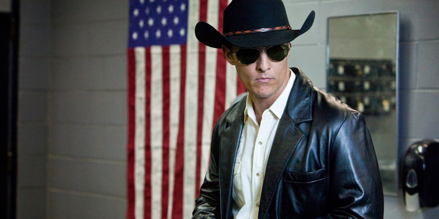 A man wearing a hat and glasses in Killer Joe.