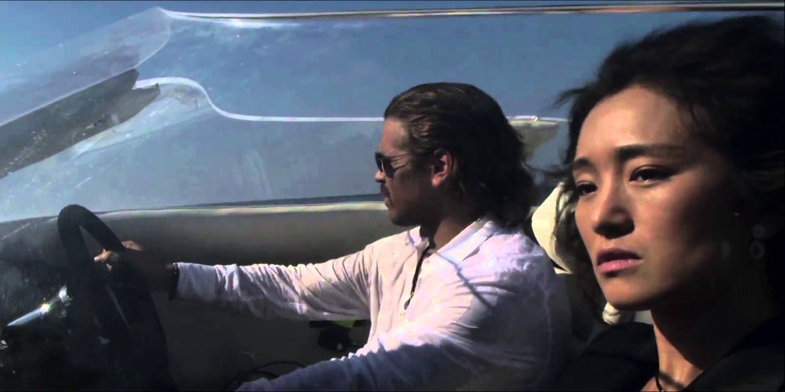 Gong Li and Colin Farrell riding a speedboat in Miami Vice
