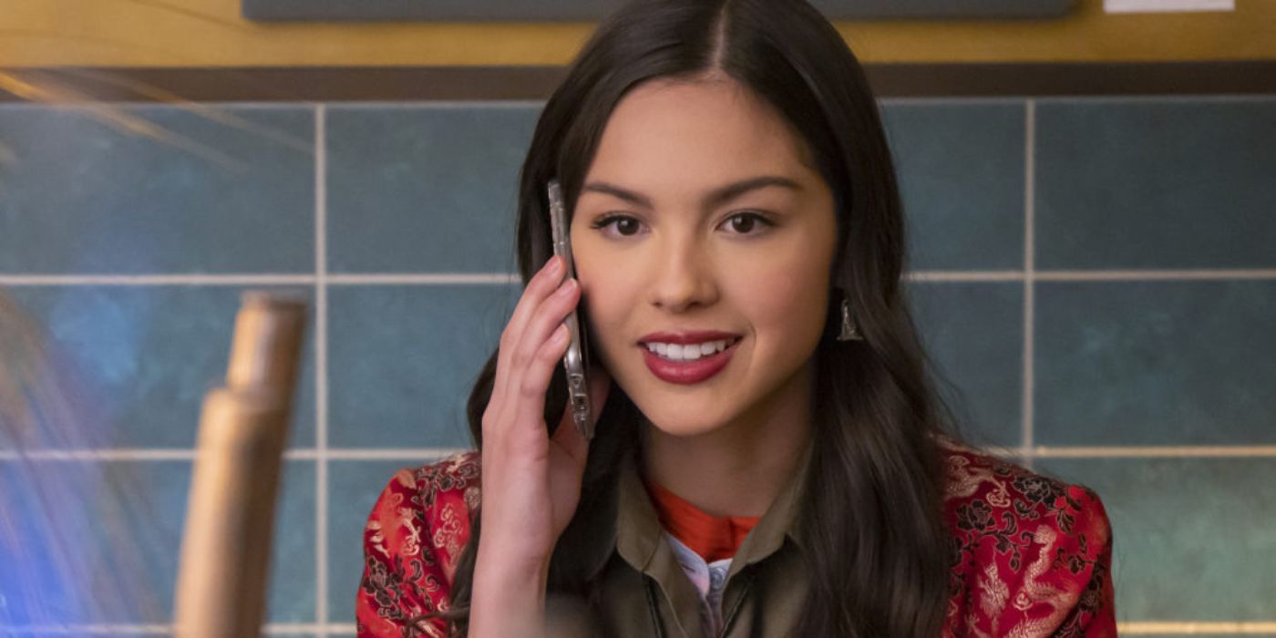 Nini (Olivia Rodrigo) smiling and talking on the phone in High School Musical: The Musical: The Series Season 2