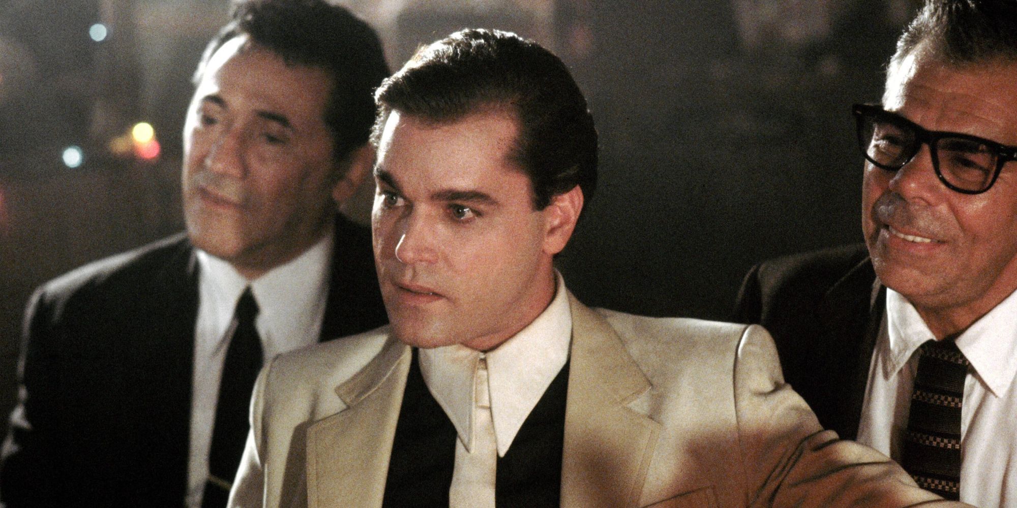 Ray Liotta with other men in business suits and ties in Goodfellas.