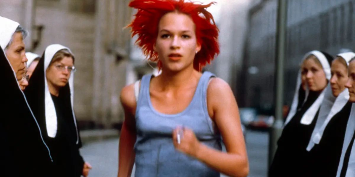 Lola (Franka Potente) runs through a group of nuns.