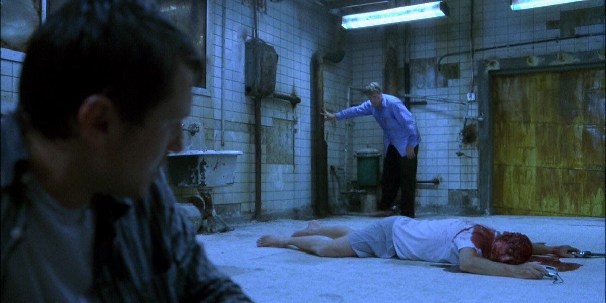 A supposedly dead body lies on the floor in &lsquo;Saw&rsquo;
