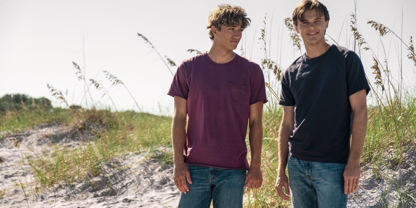 Jeremiah and Conrad stand on the beach in 'The Summer I Turned Pretty' Season 2