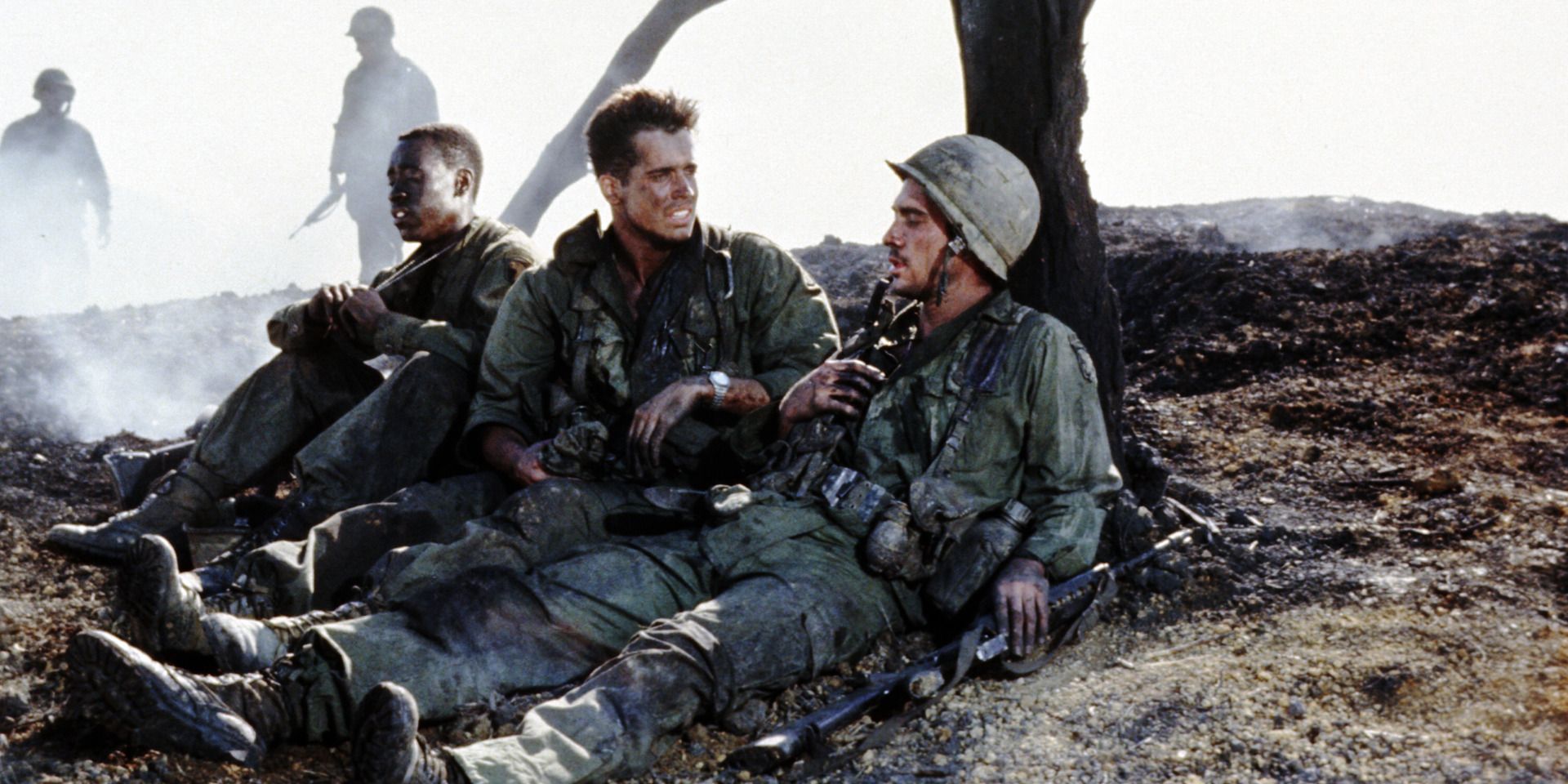 Soldiers in a smoking battlefield after a battle, from 'Hamburger Hill'