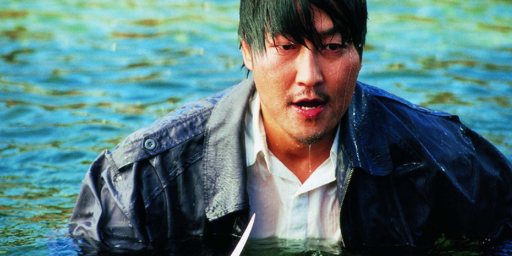 Park Dong-ji emerging from a lake in Sympathy For Mr. Vengeance