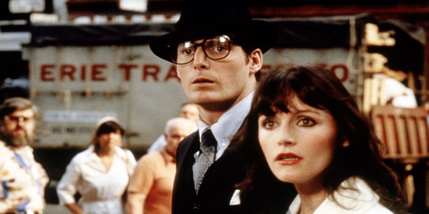 Christopher Reeve as Clark Kent and Margot Kidder as Lois Lane standing together in the street in Superman