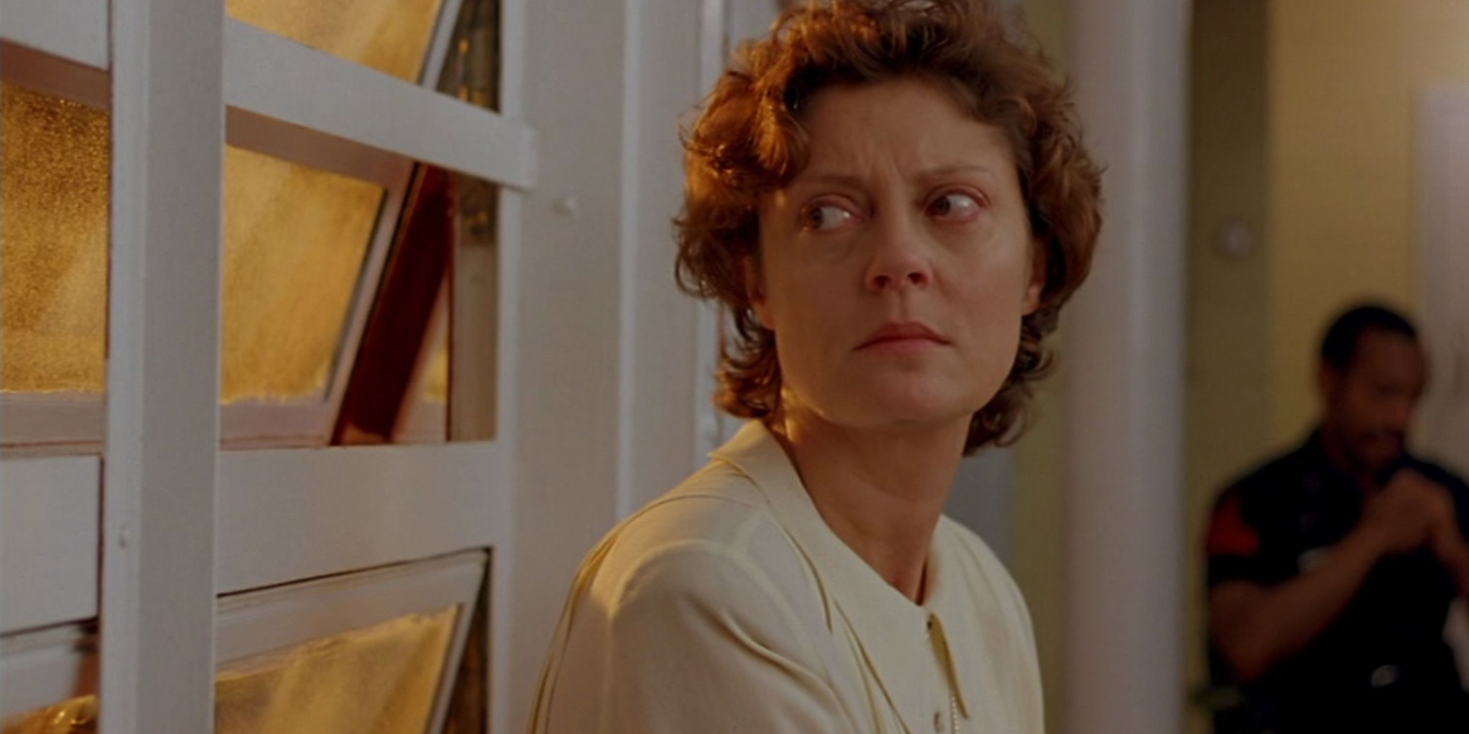 Susan Sarandon as Sister Helen Prejean in 'Dead Man Walking', she is looking concerned.