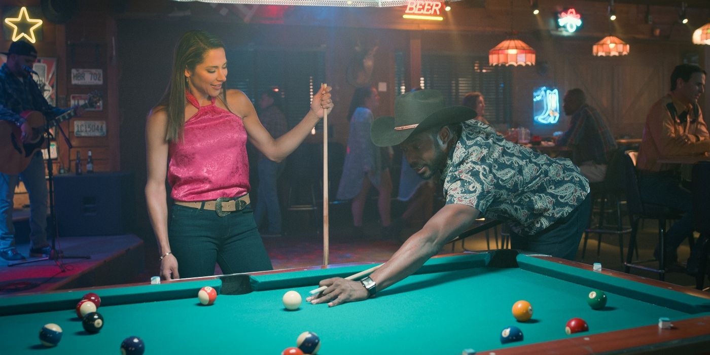 Genevieve (Nikki Estridge) and Erik (Dion Johnstone) playing pool in Season 3, Episode 8 of 'Steel Magnolias.'