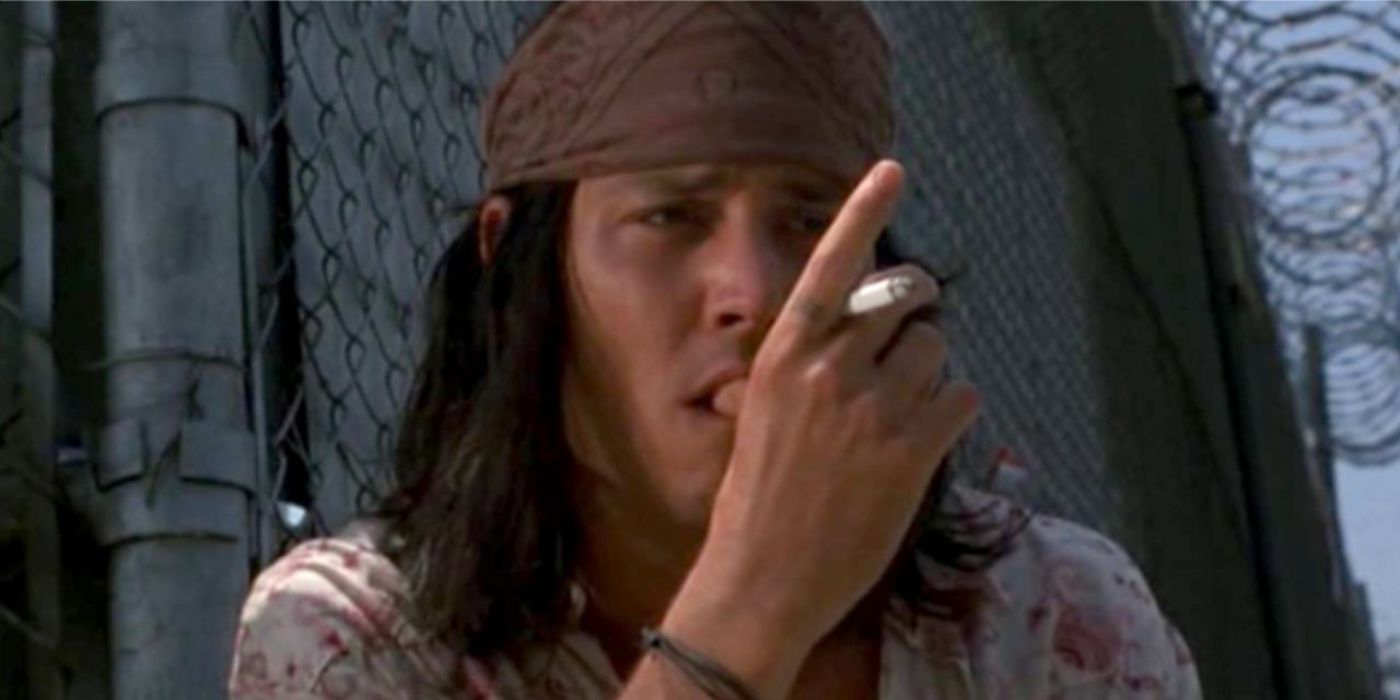 Johnny Depp smoking a cigarette in The Brave