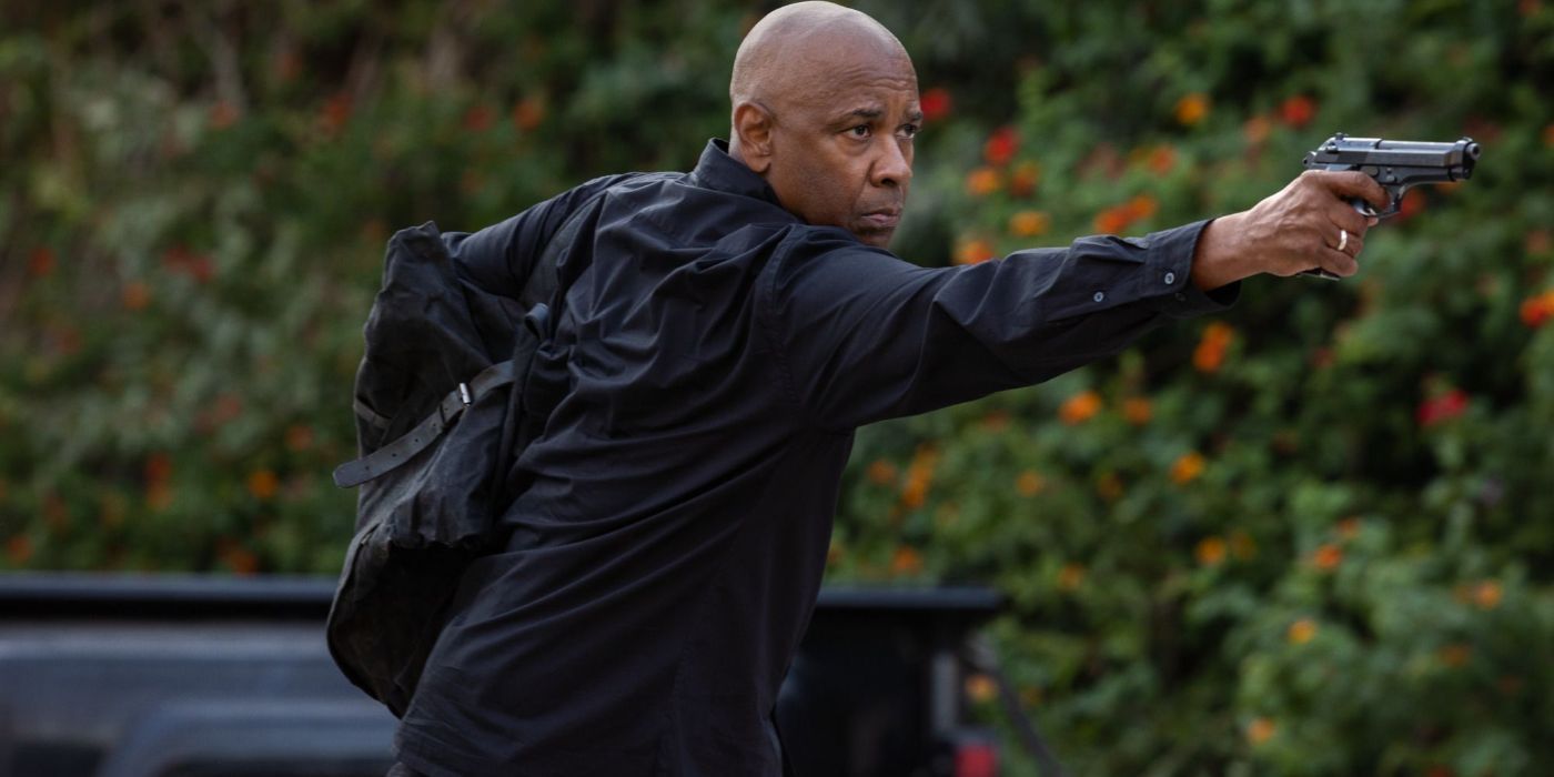 Robert McCall (Denzel Washington) pointing a gun in 'The Equalizer 3'