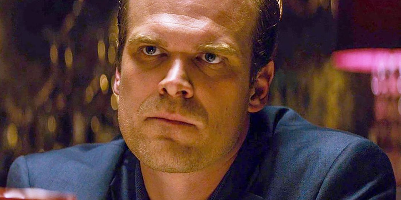 David Harbour as Frank Masters looking at a person offscreen in The Equalizer