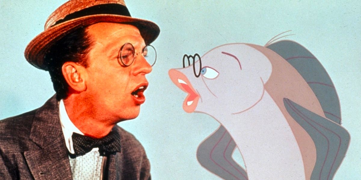 Actor Don Knotts poses alongside his fish character from 'The Incredible Mr. Limpet'