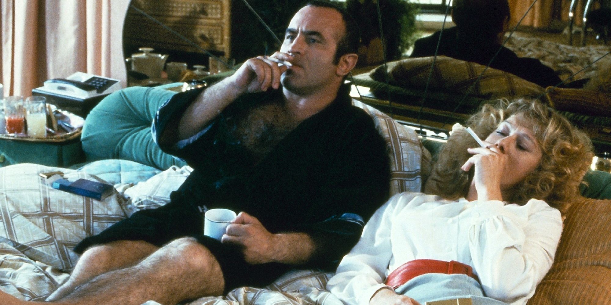 Bob Hoskins as Harold and Helen Mirren as Victoria in bed together in The Long Good Friday