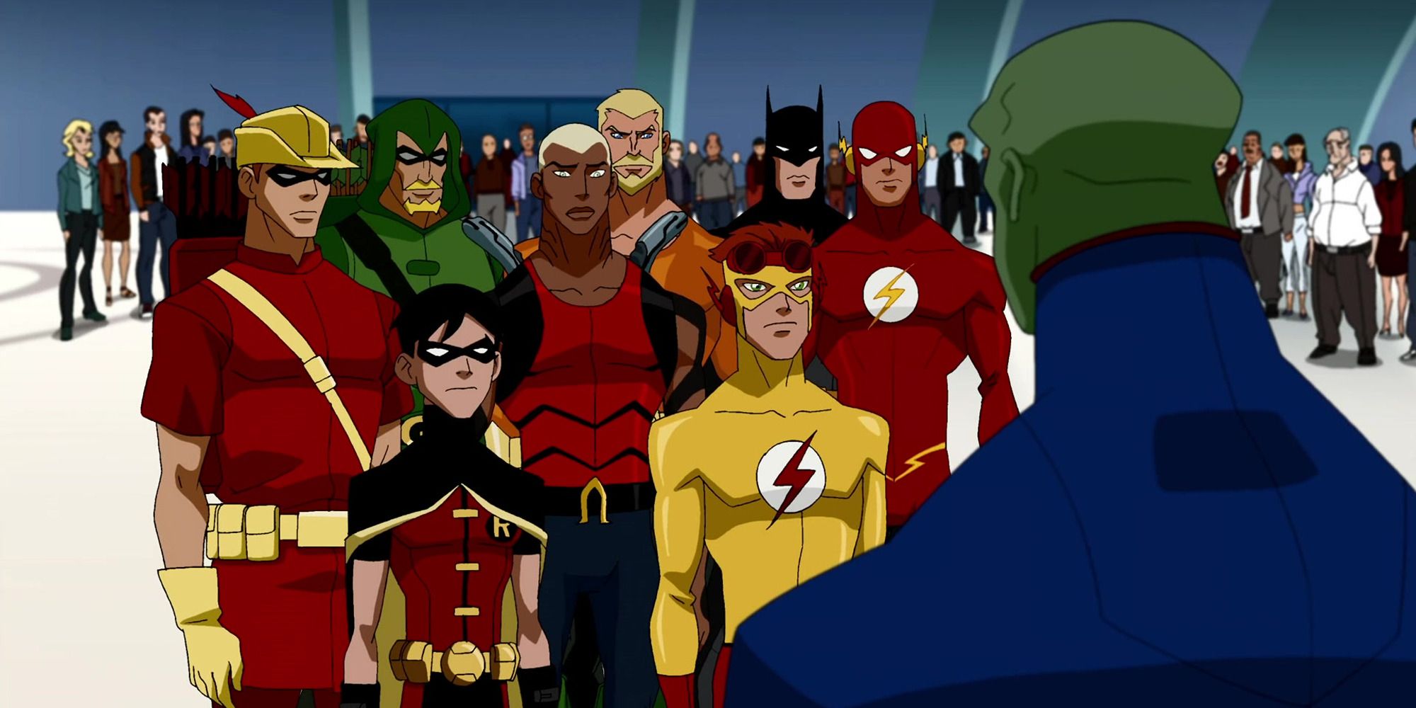 a team of DC superheroes standing in front of Martian Manhunter in 'Young Justice'