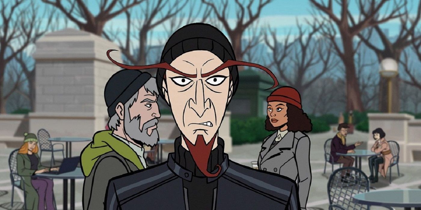 A character with extremely long eyebrows and a goatee stands center frame while people sit at tables and walk around in the background at a park in the animated series The Venture Bros.