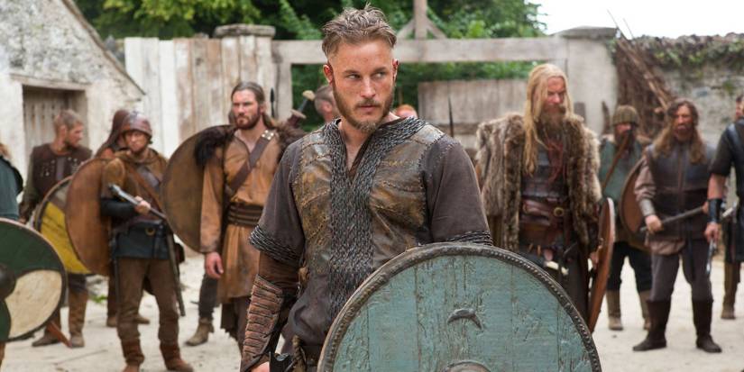 Ragnar Lothbrok (Travis Fimmel) leads a Viking raiding party on a small town in England in Vikings.