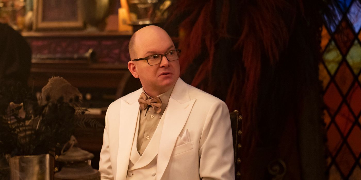 Colin Robinson, played by Mark Proksch, in a white suit in What We Do in the Shadows.