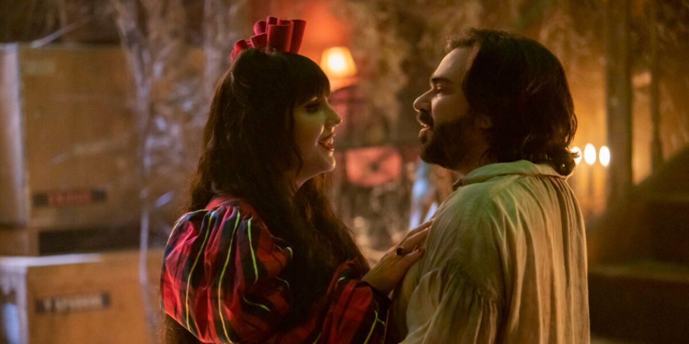 Nadja, played by Natasia Demetriou, hugging Laszlo, played by Matt Berry, in What We Do in the Shadows.