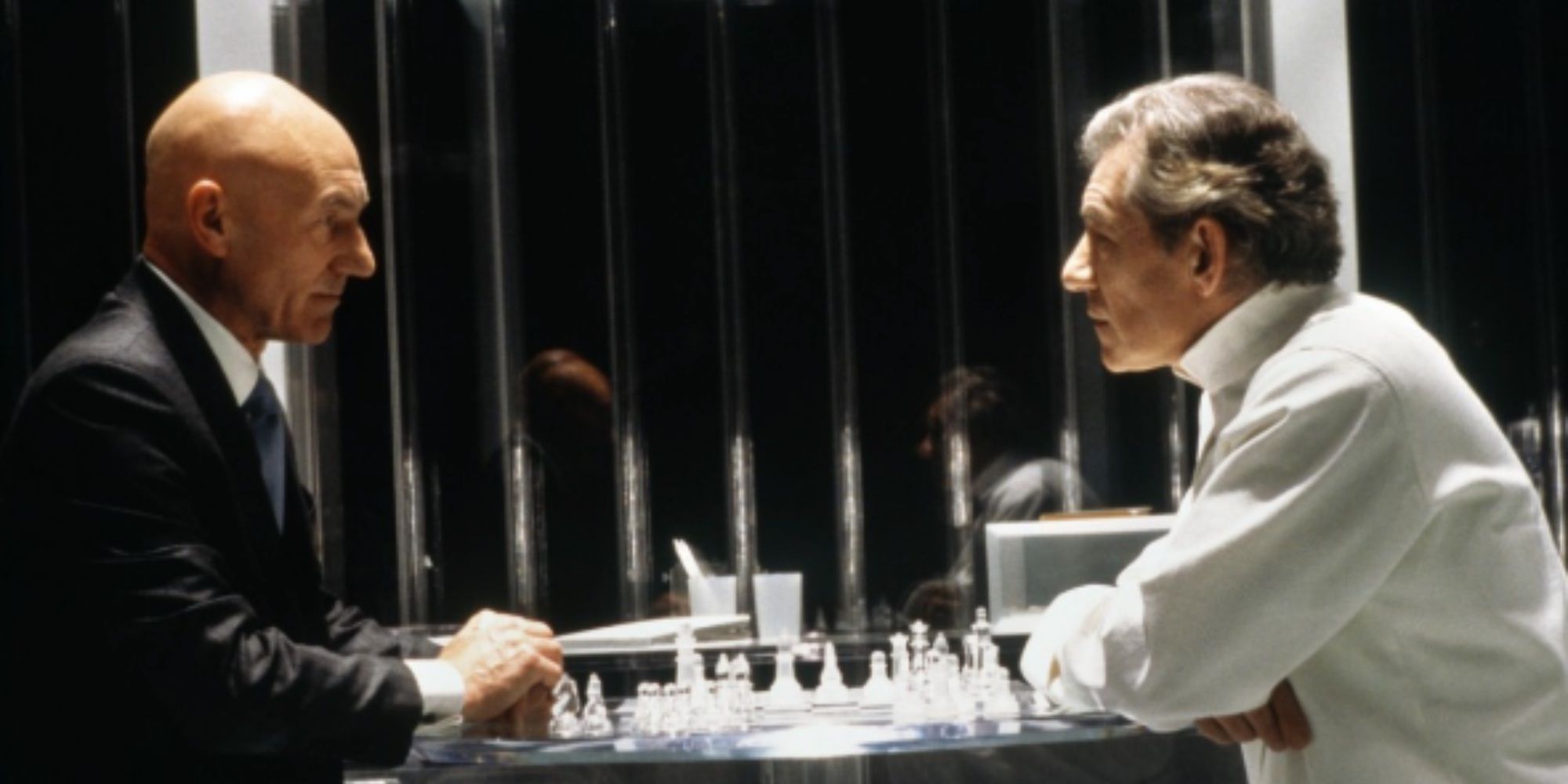Patrick Stewart as Professor X and Ian McKellen as Magneto playing chess in Magneto&rsquo;s plastic prison in X2.