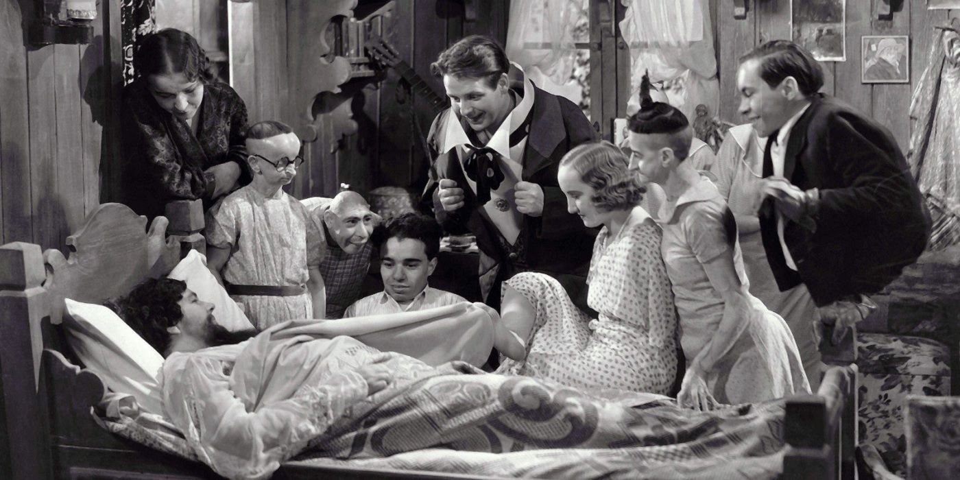 The "freaks" gather around the Bearded Lady's (Olga Roderick) bedside in 1932's 'Freaks'