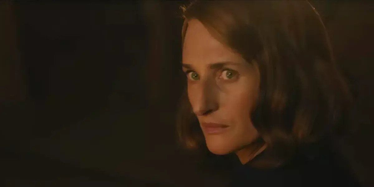 A still featuring character Olga Seminoff from A Haunting in Venice, played by Camille Cottin