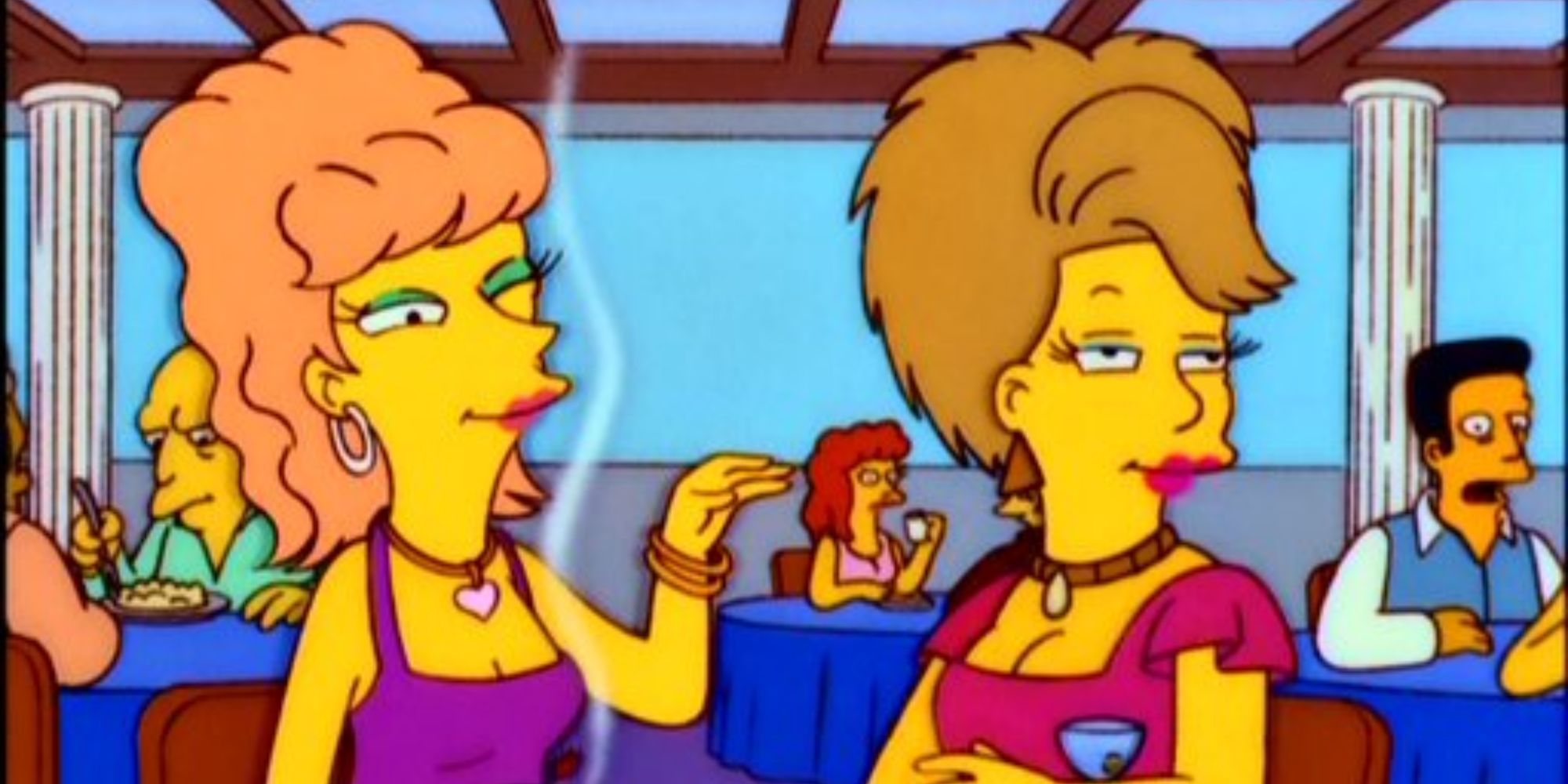 Amber sits next to her friend at a bar