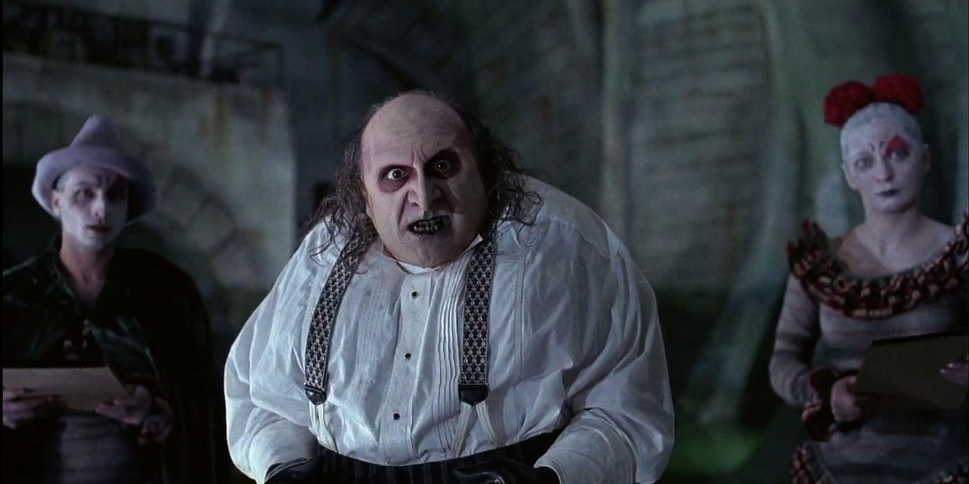 Danny DeVito as the Penguin with the Red Triangle Gang in Batman Returns