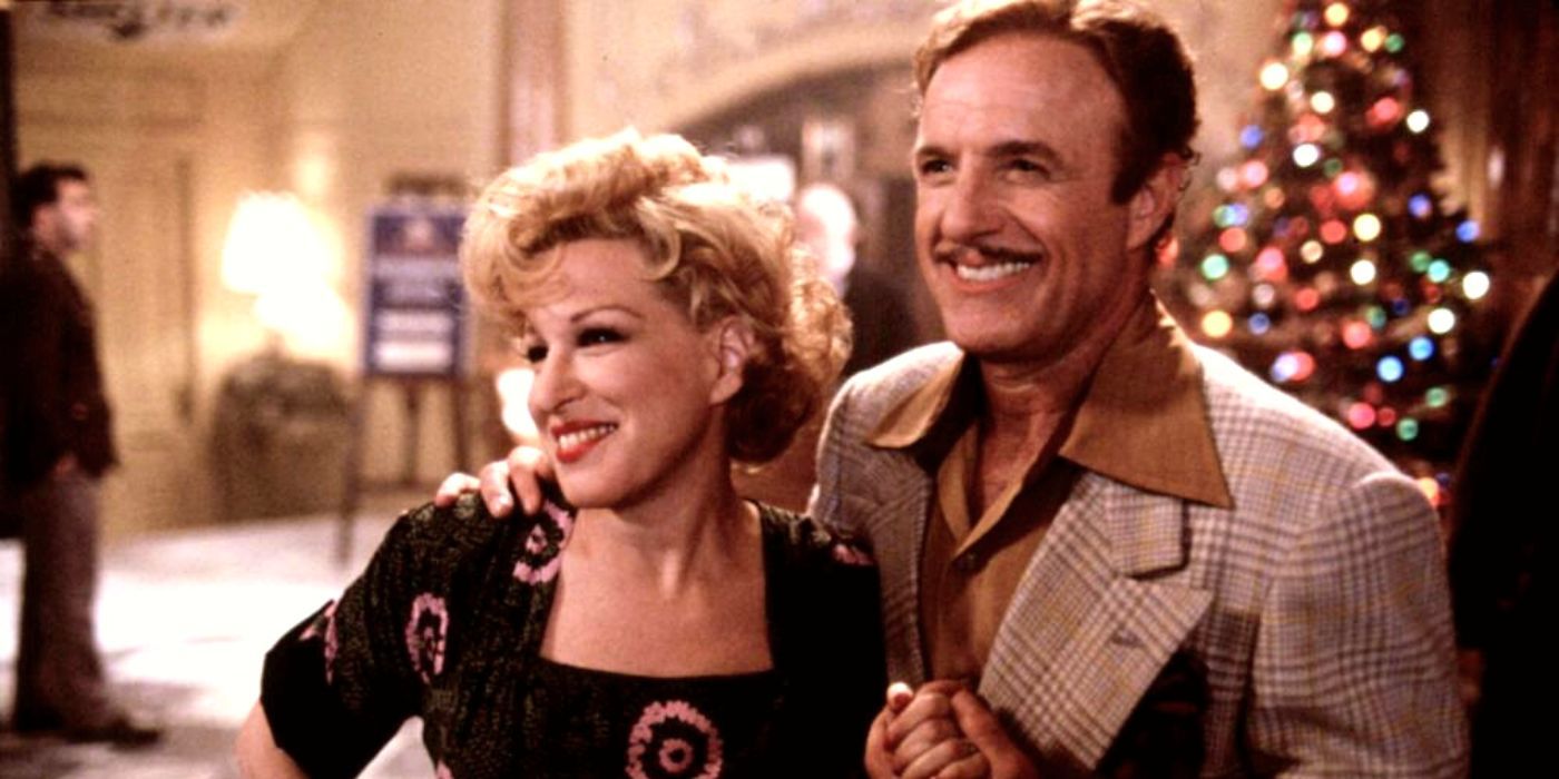 Bette Midler and James Caan standing next to each other in For the Boys (1991)